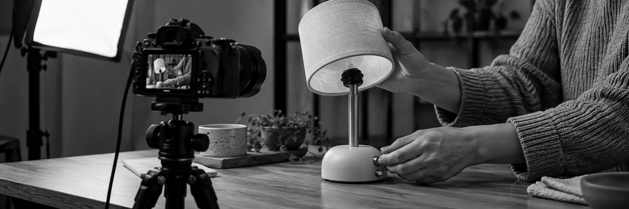 A small-business product demonstration showing how a desk lamp works.